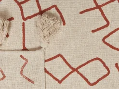 Beliani Coperta BHIWANI Cotone 130 x 180 cm Beige Beige Rosso