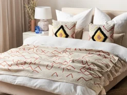 Beliani Coperta BHIWANI Cotone 130 x 180 cm Beige Beige Rosso