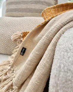 Outlet Beliani Coperta FIROZABAD Cotone 130 x 180 cm Arancione Beige Giallo