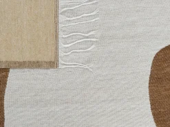 Beliani Coperta SIDDHA Tessuto 130 x 170 cm Marrone