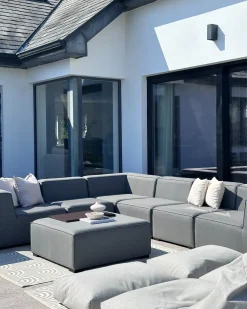 Discount Beliani Divano angolare da giardino con pouf 7 posti AREZZO Modulare Grigio Grigio Nero