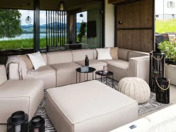 Clearance Beliani Divano angolare da giardino con pouf 7 posti AREZZO Modulare Beige Beige Nero