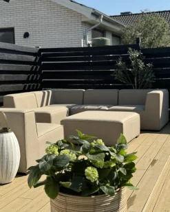 Clearance Beliani Divano angolare da giardino con pouf 7 posti AREZZO Modulare Beige Beige Nero
