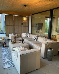 Clearance Beliani Divano angolare da giardino con pouf 7 posti AREZZO Modulare Beige Beige Nero