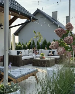 Sale Beliani Divano angolare da giardino con pouf 6 posti PALERMO Modulare Rattan sintetico (PE) Marrone Bianco Marrone