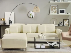 Outlet Beliani Divano angolare 5 posti OSLO Pelle naturale Beige chiaro con ottomana Lato destro Beige Argento