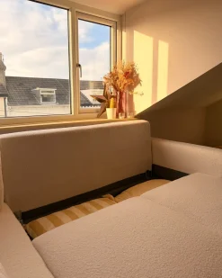 Outlet Beliani Divano letto angolare 3 posti SIRO Bouclé Bianco sporco con contenitore Lato destro Bianco Marrone