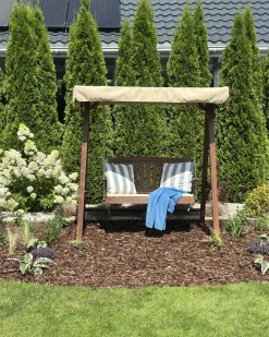Beliani Dondolo da giardino CAVIOLA Legno di abete Marrone scuro Beige Marrone