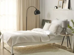 Beliani Piumone con cuscini RUDKHAN Bianco sporco Beige