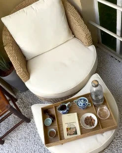 Beliani Poltrona da giardino con ottomana ARCILLE Rattan sintetico (PE) Naturale Beige Bianco Naturale