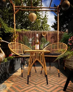 Beliani Set bistrot con cuscini PELLARO Rattan sintetico (PE) Nero Beige Naturale Nero