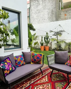 Sale Beliani Set da giardino con tavolo 4 posti RAGUSA Rattan sintetico (PE) Grigio Grigio Nero