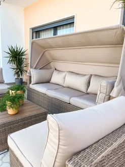 New Beliani Set da giardino con tavolo 5 posti COCCOLIA Modulare Rattan sintetico (PE) Beige Beige Marrone