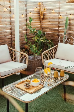 Online Beliani Set da giardino con tavolo 4 posti CORINTH II Rattan sintetico (PE) Naturale Marrone Grigio Nero