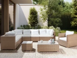 Outlet Beliani Set da giardino con tavolo 8 posti XXL Lato destro Modulare Rattan sintetico (PE) Beige sabbia Bianco Beige