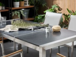 Best Beliani da giardino 6 posti GROSSETO Piastra tripla Basalto fiammato Nero Argento Grigio Nero