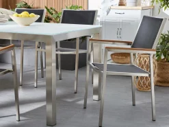 Clearance Beliani Set da pranzo da giardino 6 posti GROSSETO Piastra tripla Granito Lucido Nero/Grigio Argento Grigio Nero