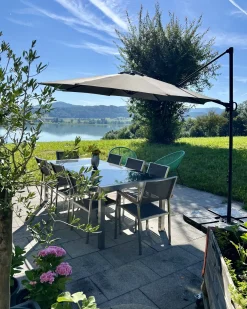 Clearance Beliani Set da pranzo da giardino 8 posti GROSSETO Piastra tripla Granito Lucido Nero/Grigio Argento Grigio Nero