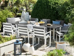 Beliani Set da pranzo da giardino 8 posti PANCOLE con cuscini Metallo Grigio Bianco Grigio