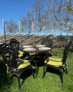 Sale Beliani Set da pranzo da giardino 4 posti SAPRI con cuscini Metallo Marrone scuro Verde Marrone