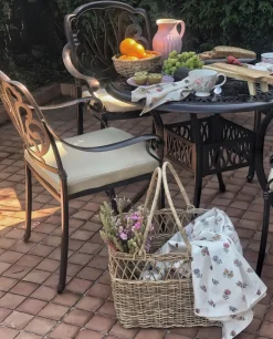 Outlet Beliani Set da pranzo da giardino 4 posti ANCONA con cuscini Metallo Marrone scuro Beige Marrone
