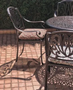 Outlet Beliani Set da pranzo da giardino 4 posti ANCONA con cuscini Metallo Marrone scuro Beige Marrone