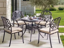 Outlet Beliani Set da pranzo da giardino 4 posti ANCONA con cuscini Metallo Marrone scuro Beige Marrone