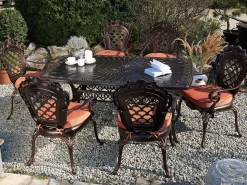 Best Beliani Set da pranzo da giardino 6 posti LIZZANO con cuscini Metallo Marrone scuro Arancione Marrone