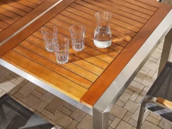New Beliani Set da pranzo da giardino 8 posti GROSSETO Legno d'eucalipto Marrone/Beige Beige Argento Marrone