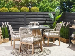 Clearance Beliani Set da pranzo da giardino 4 posti OLBIA con cuscini Cemento Beige Beige Marrone Grigio