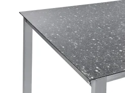 Outlet Beliani Set da pranzo da giardino 4 posti COSOLETO/GROSSETO Vetro temperato Effetto granito Nero Argento Nero
