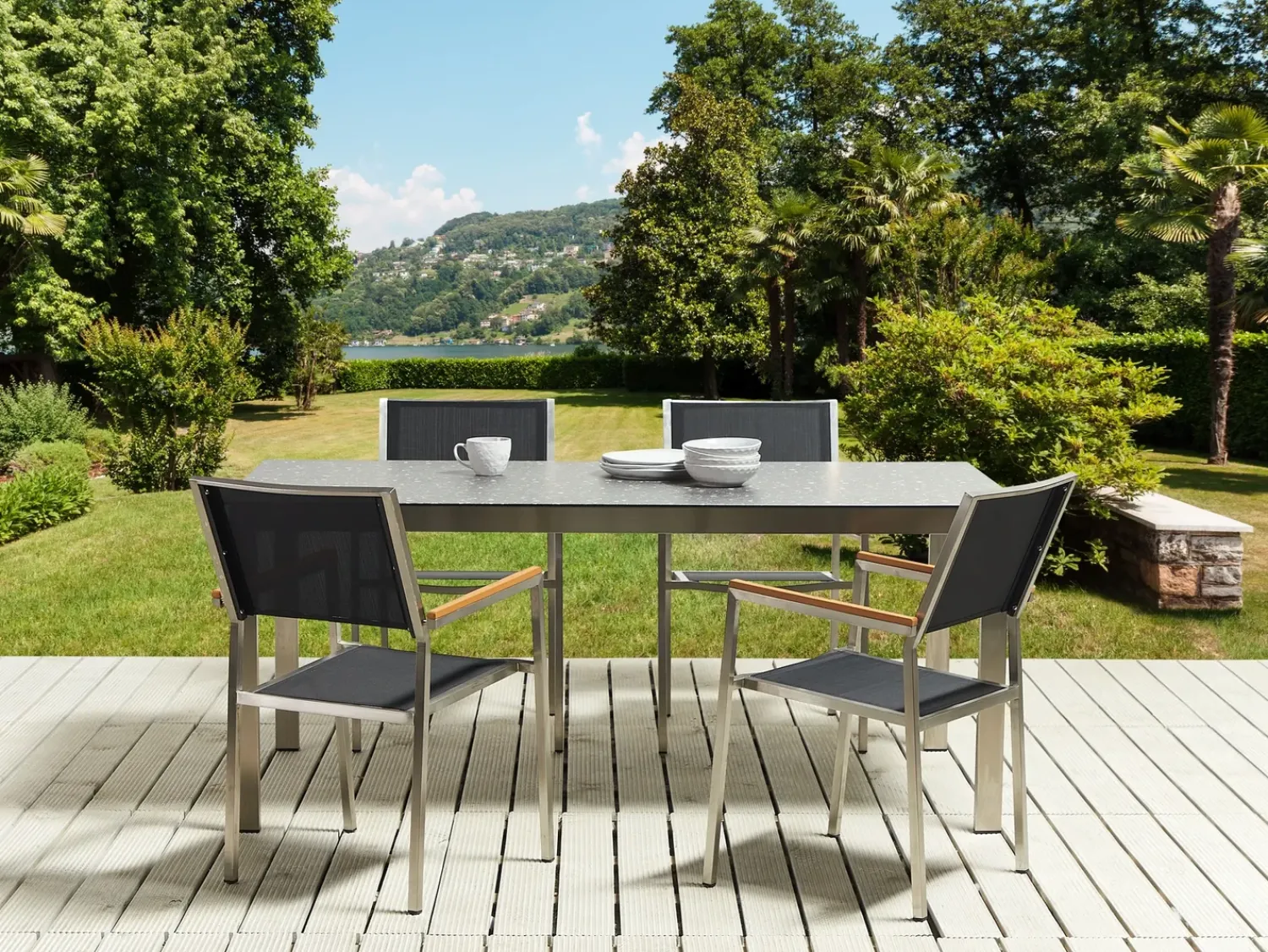 Outlet Beliani Set da pranzo da giardino 4 posti COSOLETO/GROSSETO Vetro temperato Effetto granito Nero Argento Nero
