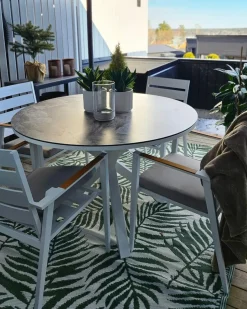 Clearance Beliani Set da pranzo da giardino 4 posti MALETTO/TAVIANO con cuscini Metallo Effetto marmo Grigio Bianco Marrone Grigio