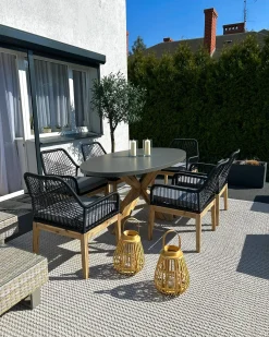 New Beliani Set da pranzo da giardino 6 posti ORISTANO con cuscini Cemento Nero Grigio Marrone Nero