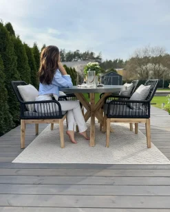 Clearance Beliani Set da pranzo da giardino 4 posti ORISTANO con cuscini Cemento Nero Marrone Grigio Nero