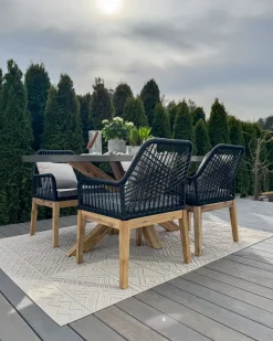 Clearance Beliani Set da pranzo da giardino 4 posti ORISTANO con cuscini Cemento Nero Marrone Grigio Nero