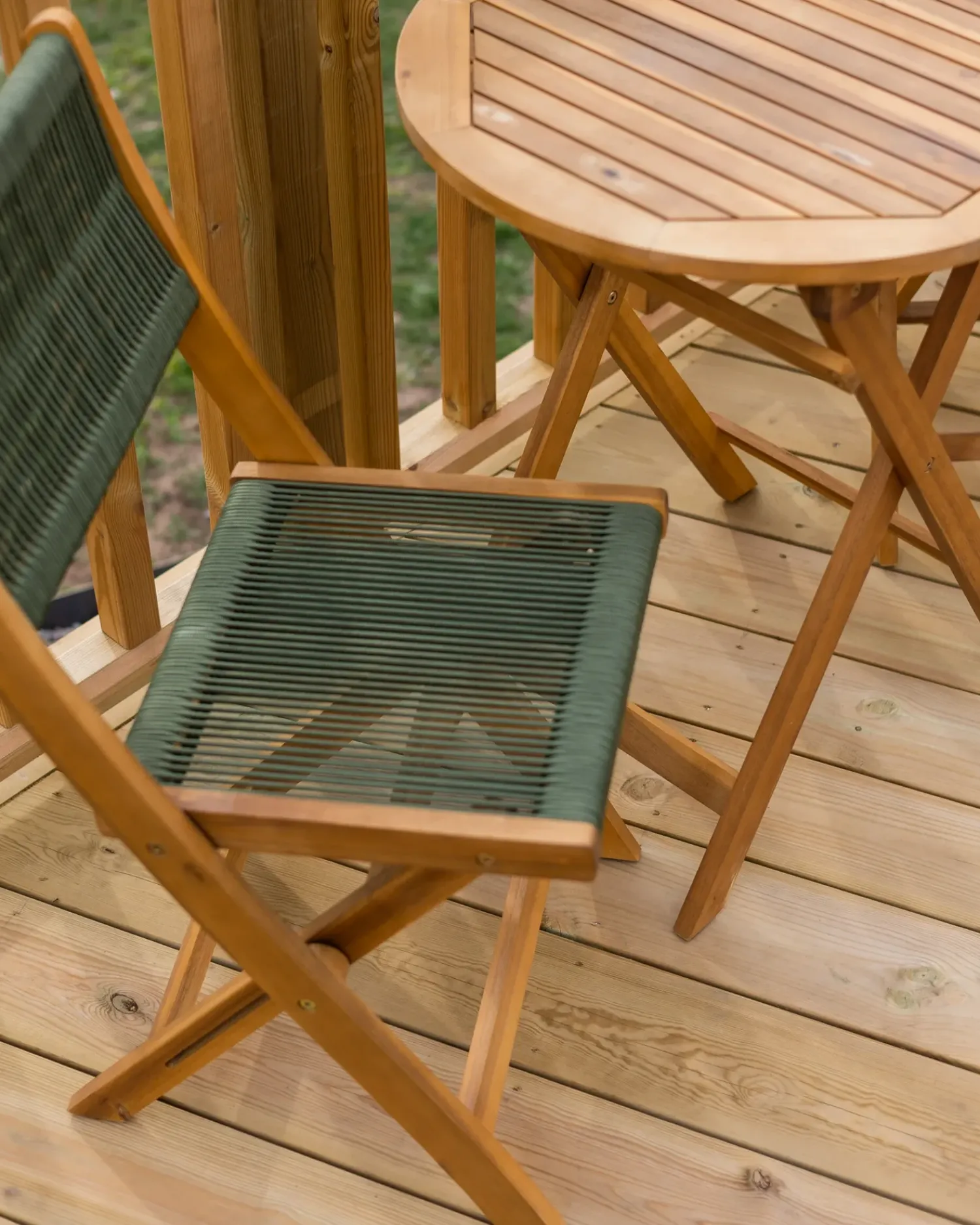 Beliani Set da pranzo da giardino 4 posti PROSSEDI Legno d'acacia Verde Marrone Verde