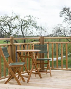 Beliani Set da pranzo da giardino 4 posti PROSSEDI Legno d'acacia Verde Marrone Verde
