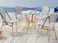 Outlet Beliani Set da pranzo da giardino 4 posti RIFREDDO Rattan sintetico (PE) Nero/Bianco Bianco Beige Naturale Nero