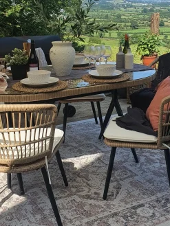 Beliani Set da pranzo da giardino 6 posti ALIANO II con cuscini Rattan sintetico (PE) Beige Beige Beige Naturale Nero