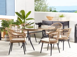 Beliani Set da pranzo da giardino 6 posti ALIANO II con cuscini Rattan sintetico (PE) Beige Beige Beige Naturale Nero