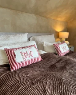 Beliani Set di 2 cuscini ALSINE Cotone 30 x 50 cm Rosso A strisce Bianco Rosso