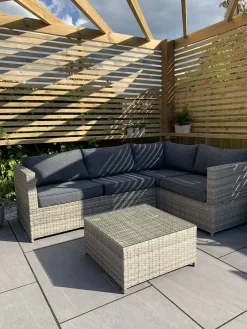 Outlet Beliani Set di divani angolari da giardino 4 posti AVOLA Lato Sinistro Rattan sintetico (PE) Grigio