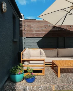 Hot Beliani Set di divani angolari da giardino 4 posti TIMOR Modulare Legno di acacia certificato Marrone chiaro Beige Marrone Grigio