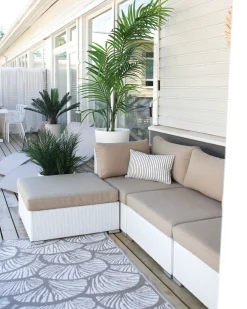 Beliani Set di divani angolari da giardino 4 posti SANO Modulare Rattan sintetico (PE) Bianco Bianco Beige