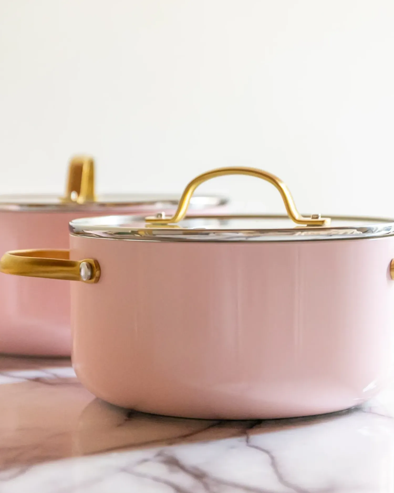 Clearance Beliani Set di 7 padelle ELITE PRO Rosa pastello Bianco Oro Rosa