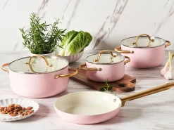 Clearance Beliani Set di 7 padelle ELITE PRO Rosa pastello Bianco Oro Rosa