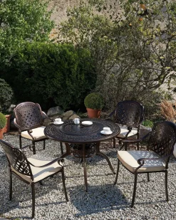 Beliani Set di 4 sedie da giardino con cuscini MANFRIA Metallo Marrone scuro Beige Marrone