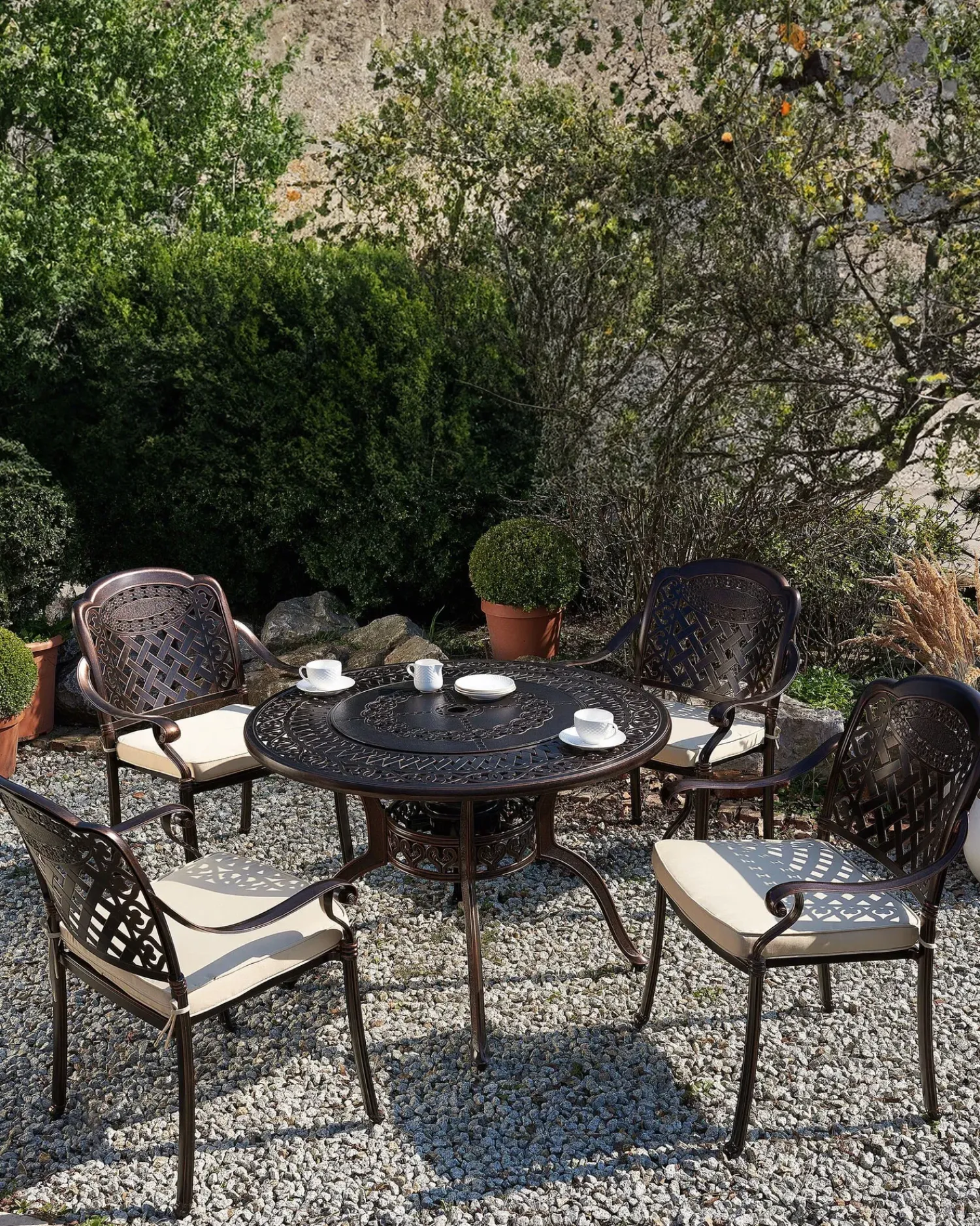 Beliani Set di 4 sedie da giardino con cuscini MANFRIA Metallo Marrone scuro Beige Marrone