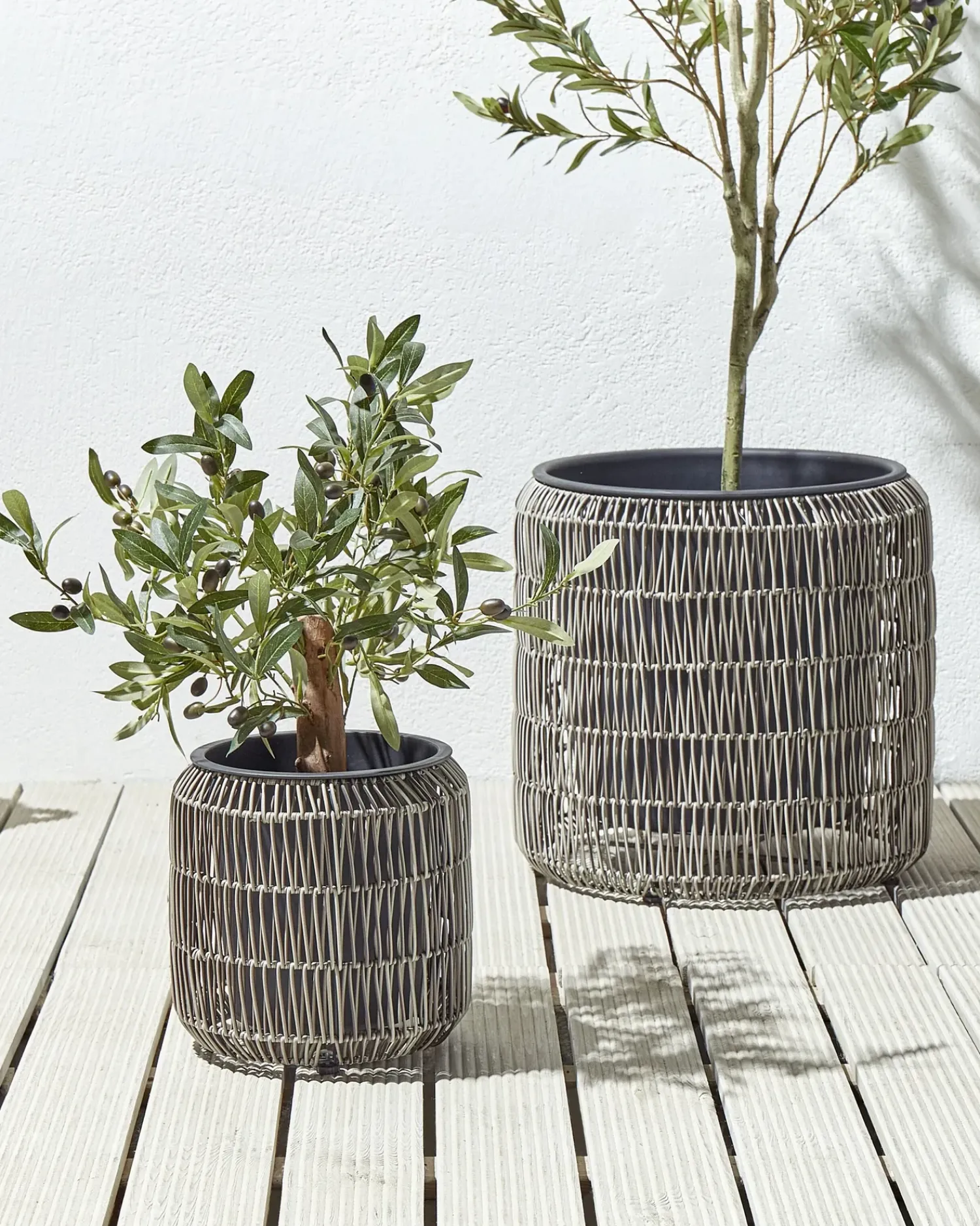 Beliani Set di 2 vasi per piante BRODIEA Rattan sintetico (PE) 26/45 cm chiaro Marrone